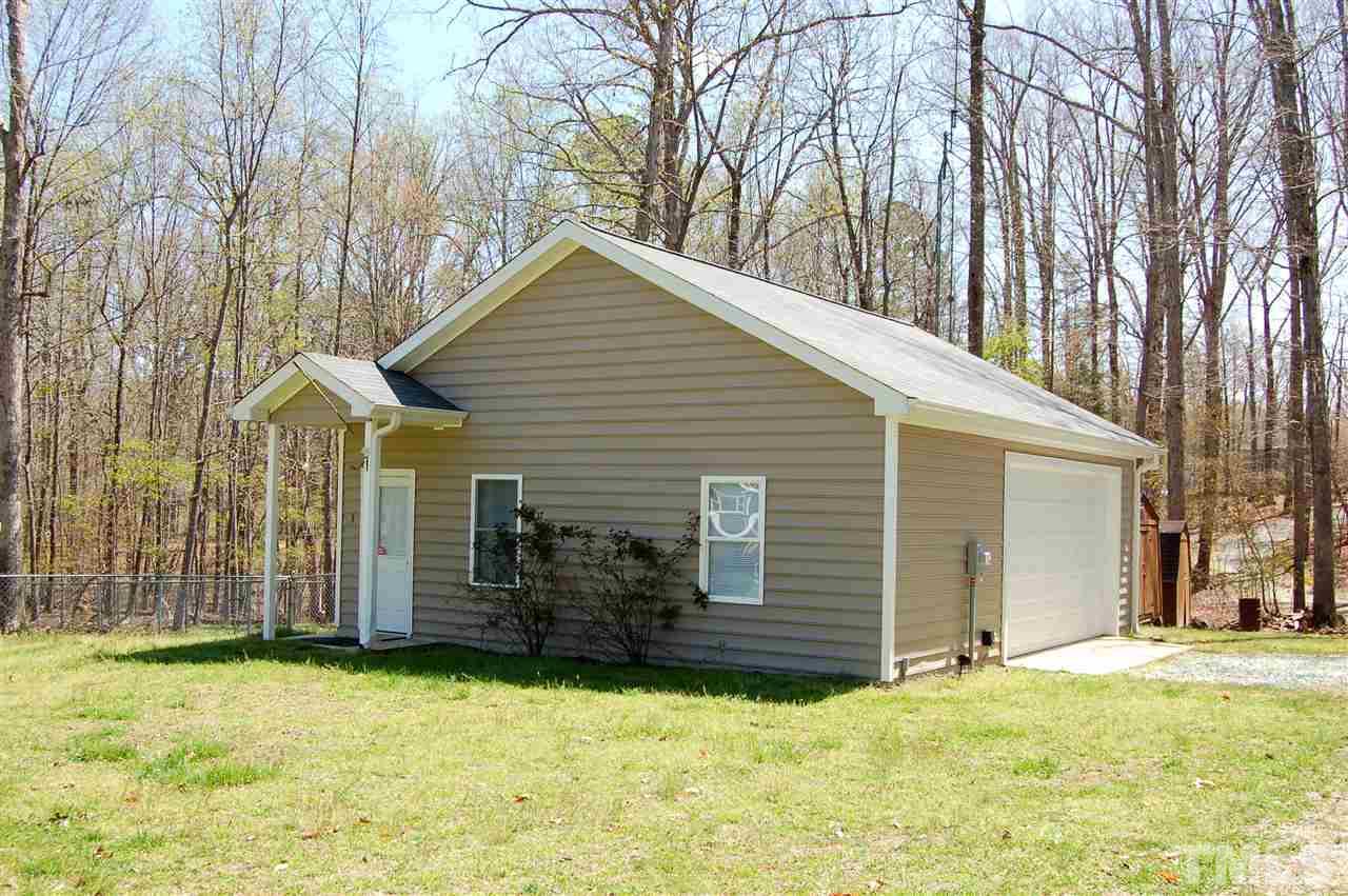 300 Barclay Road Durham, NC 27712 - Photo 4 of 25 a view of a house with a yard