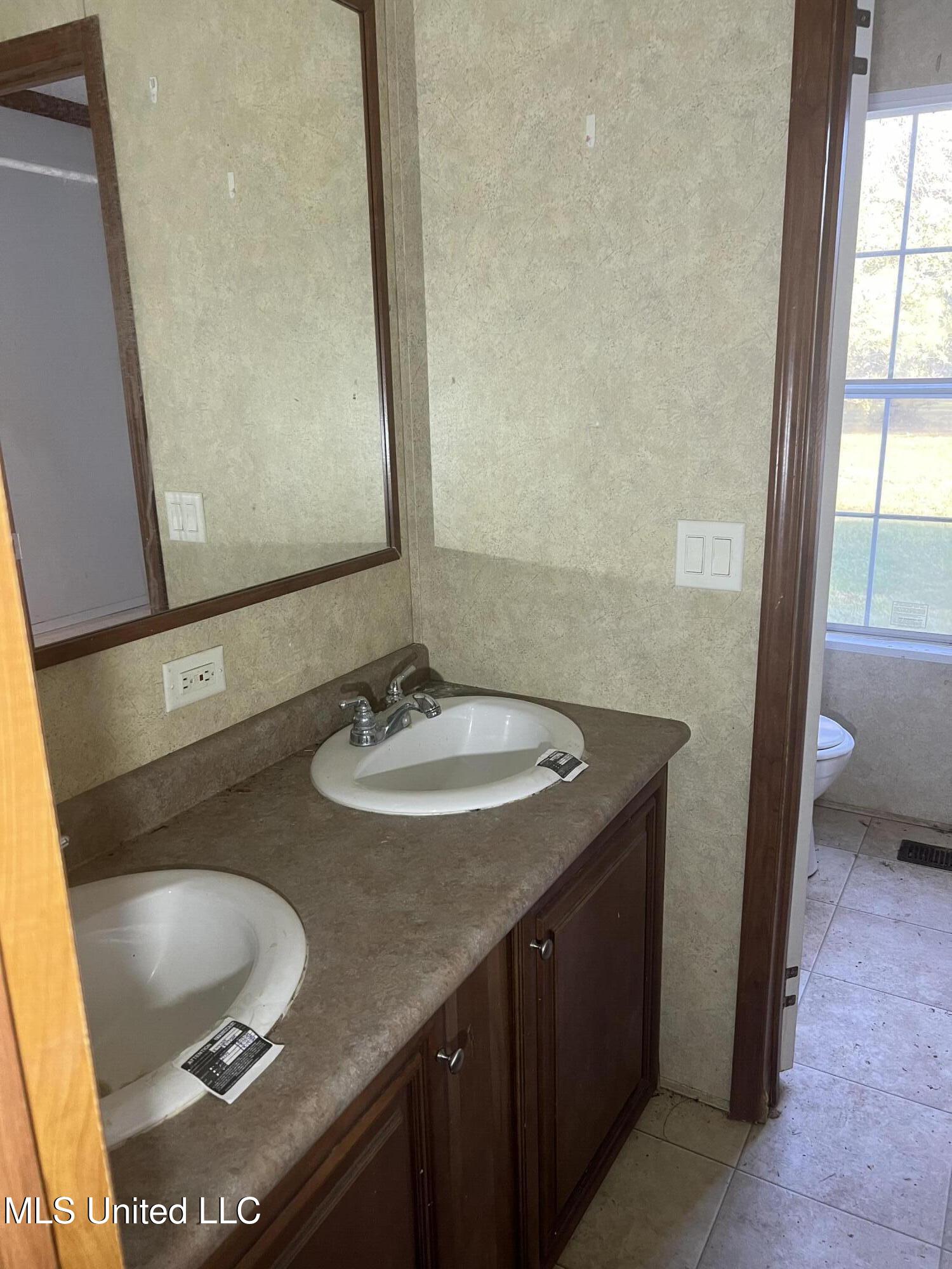 2774 Loyd Star Lane Northwest Wesson, MS 39191 - Photo 31 of 32 2774 lone star hall bathroom
