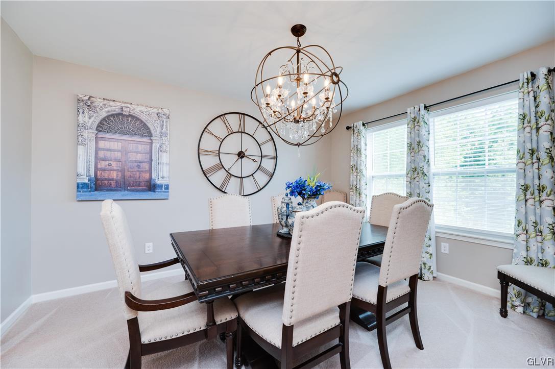 238 Longview Drive Reading, PA 19608 - Photo 11 of 43 a view of a dining room with furniture window and wooden floor