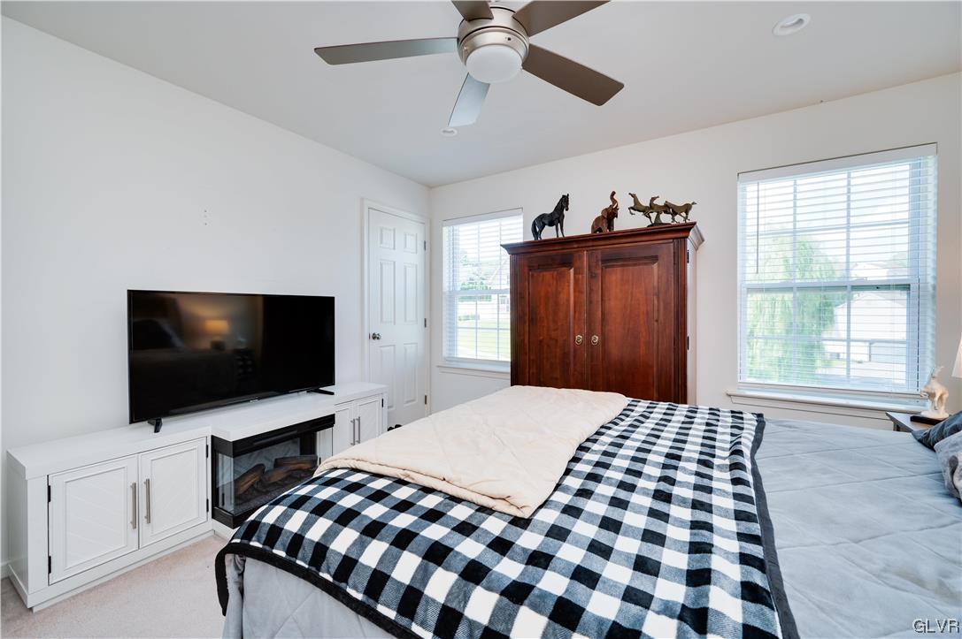 238 Longview Drive Reading, PA 19608 - Photo 32 of 43 a bedroom with a bed and a flat screen tv
