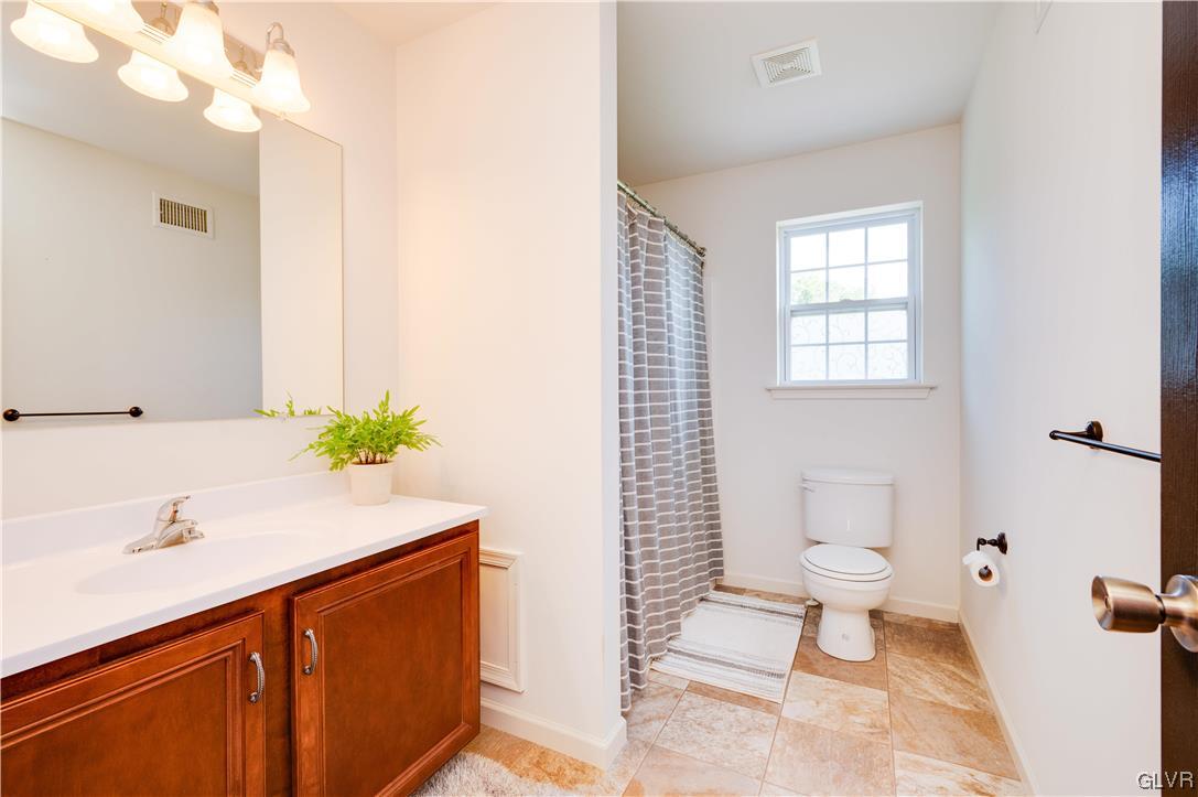 238 Longview Drive Reading, PA 19608 - Photo 36 of 43 a bathroom with a sink toilet and shower