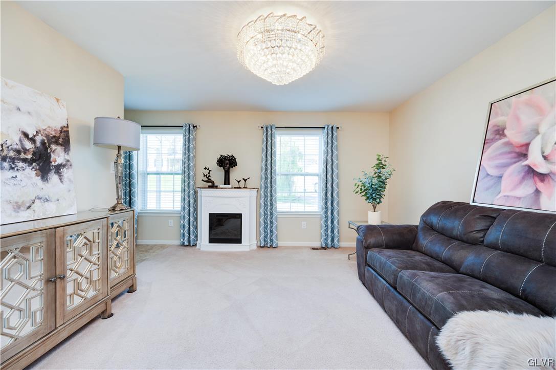 238 Longview Drive Reading, PA 19608 - Photo 8 of 43 a living room with furniture and a fireplace