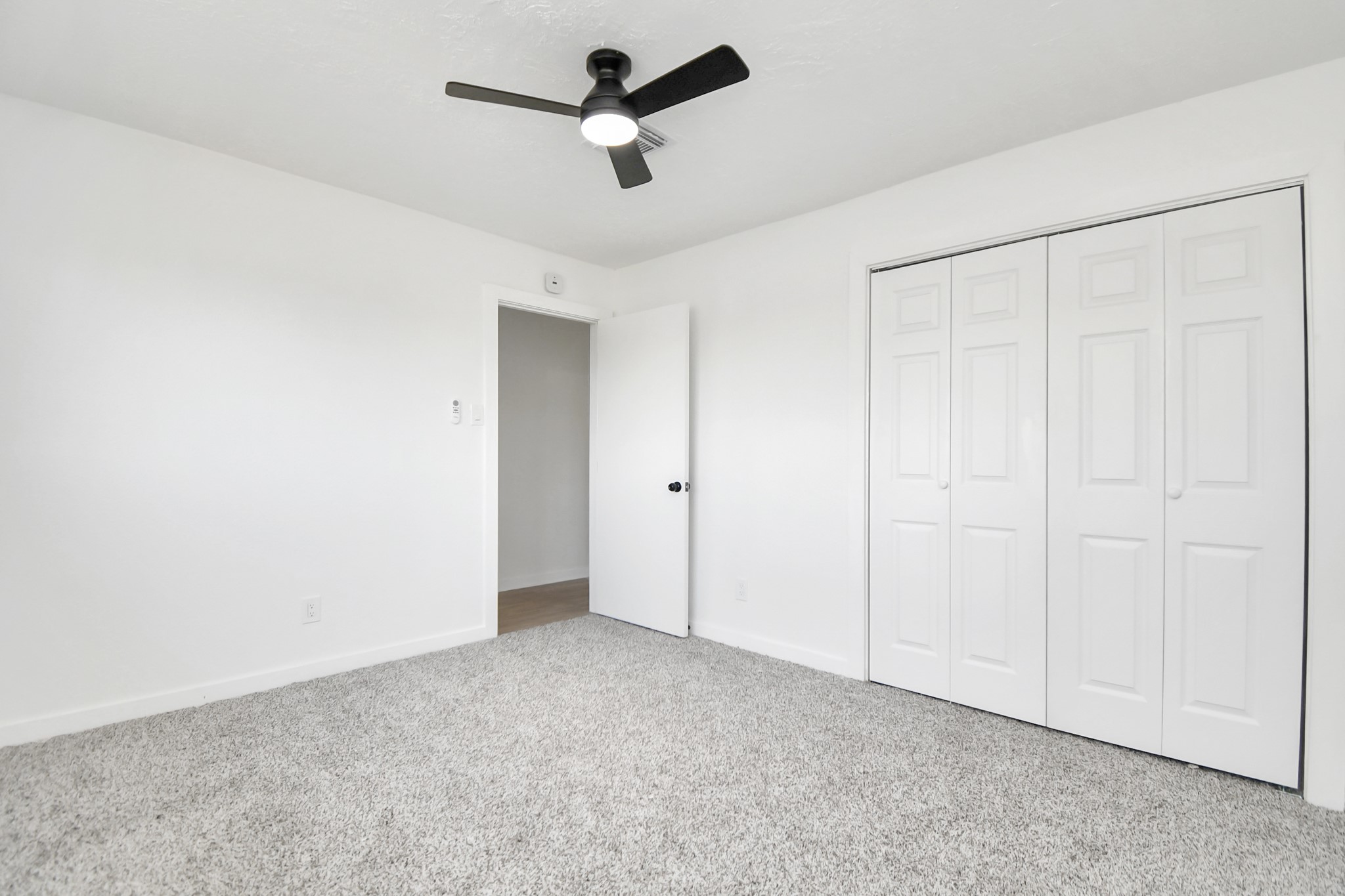 9912 Cardinal Street La Porte, TX 77571 - Photo 15 of 34 an empty room with a ceiling fan