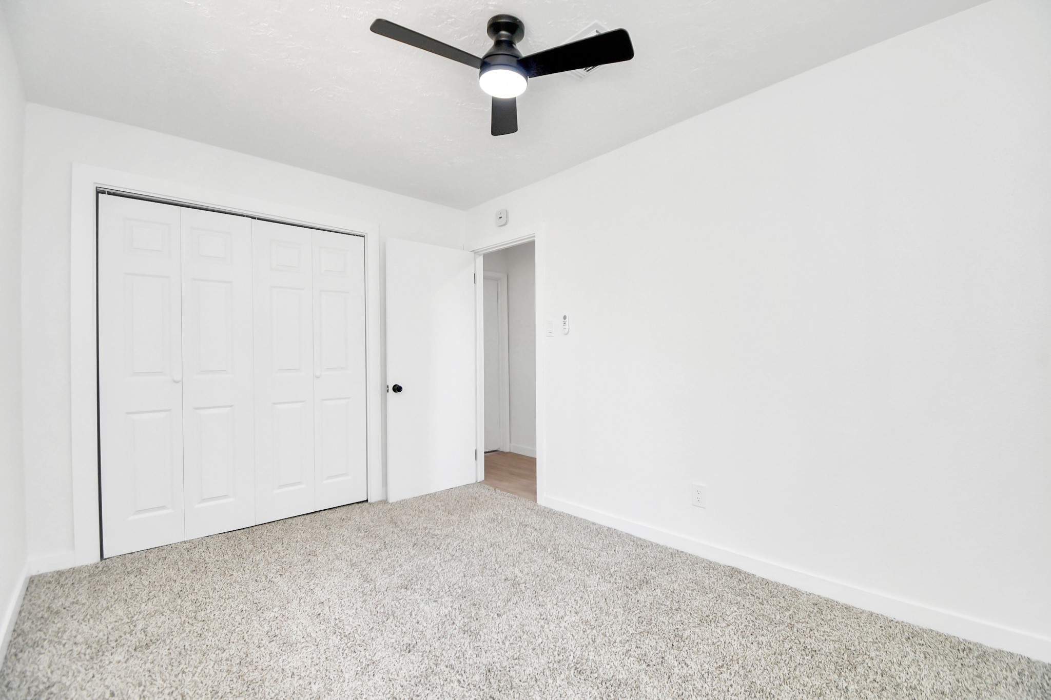 9912 Cardinal Street La Porte, TX 77571 - Photo 19 of 34 a view of a room with a ceiling fan