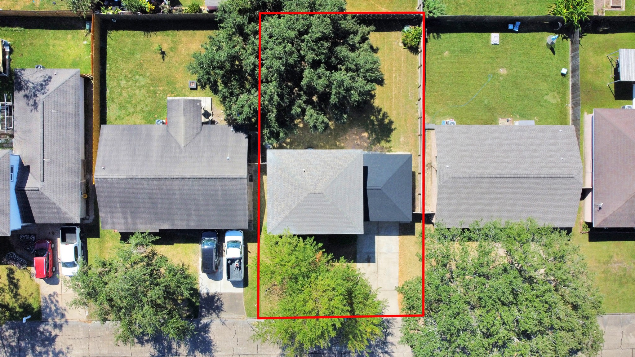 9912 Cardinal Street La Porte, TX 77571 - Photo 32 of 34 an aerial view of a house with a garden and a large tree