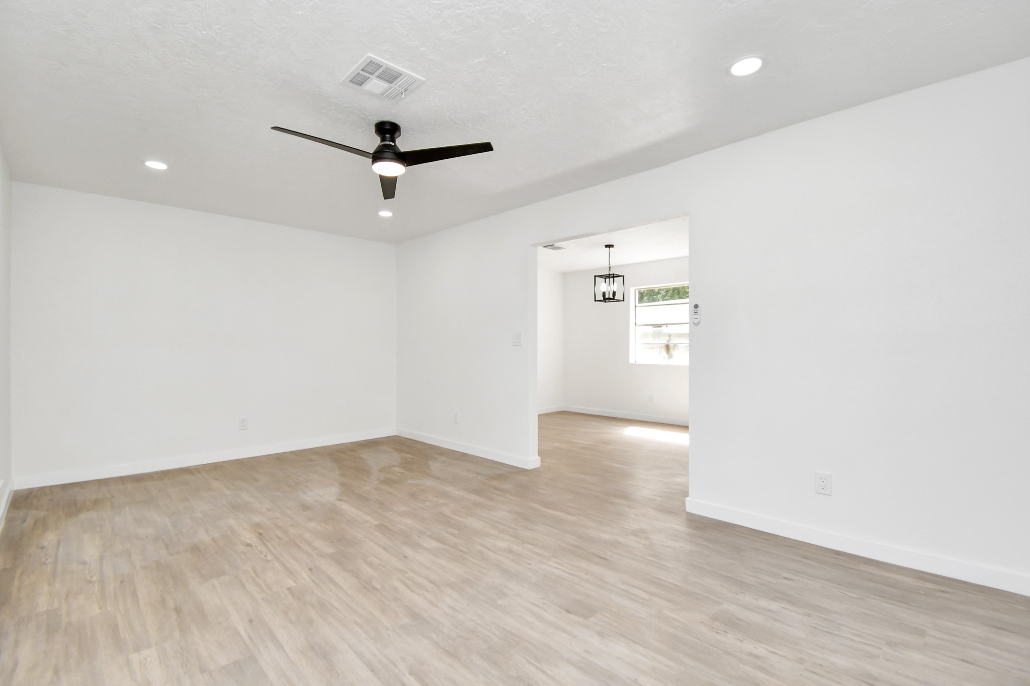 9912 Cardinal Street La Porte, TX 77571 - Photo 5 of 34 wooden floor in an empty room