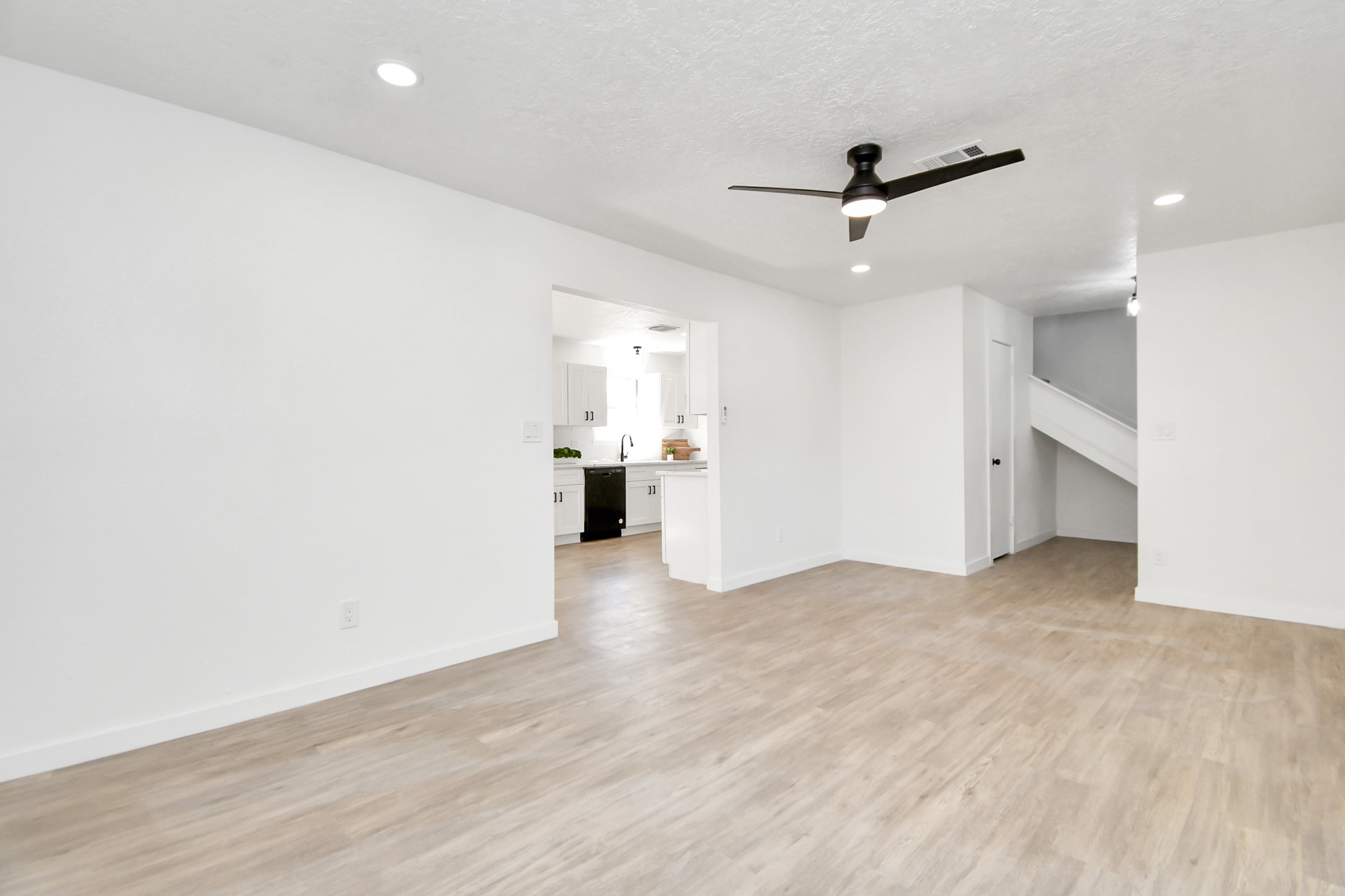 9912 Cardinal Street La Porte, TX 77571 - Photo 7 of 34 wooden floor in an empty room with a window