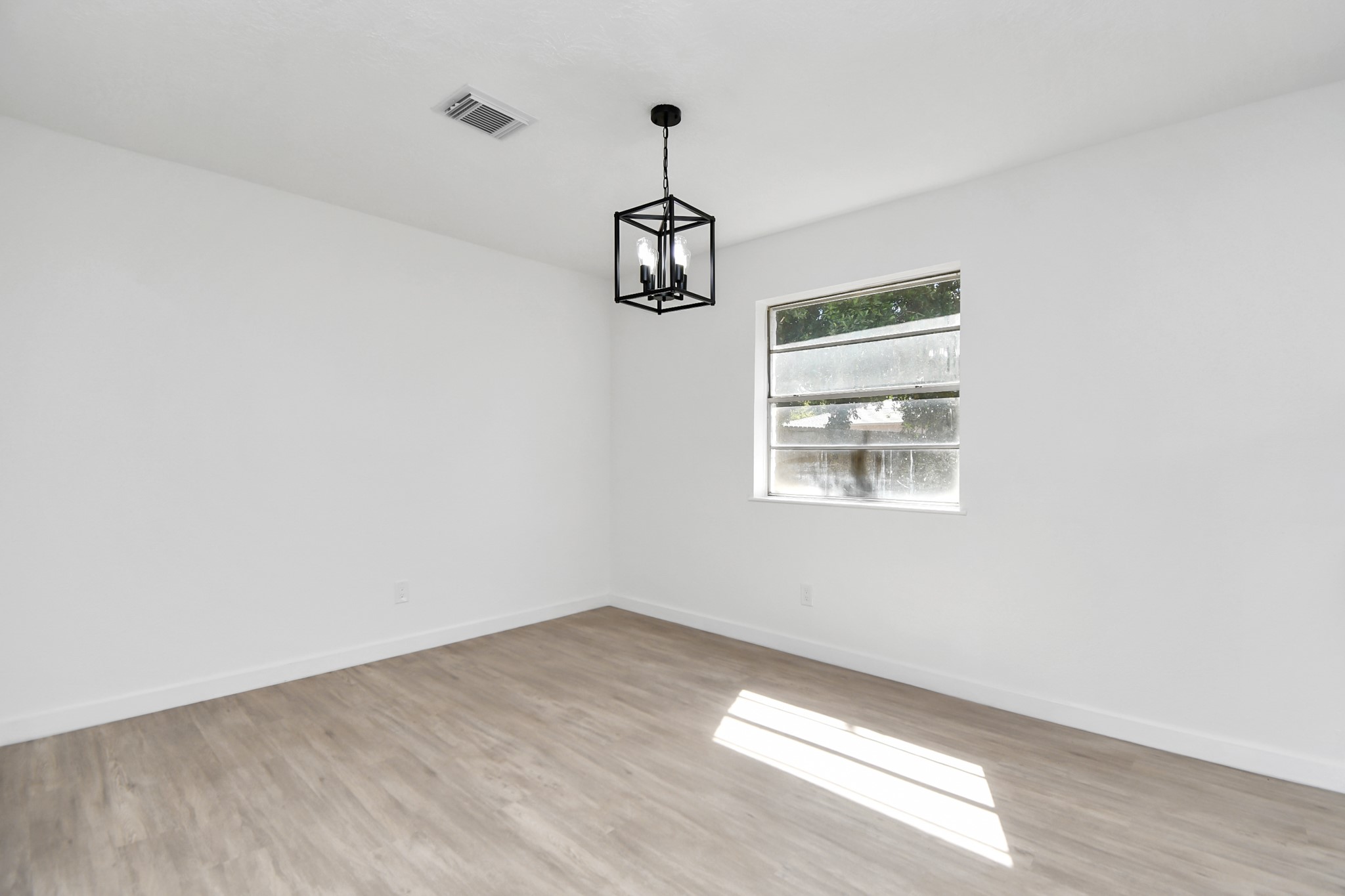 9912 Cardinal Street La Porte, TX 77571 - Photo 8 of 34 wooden floor in an empty room