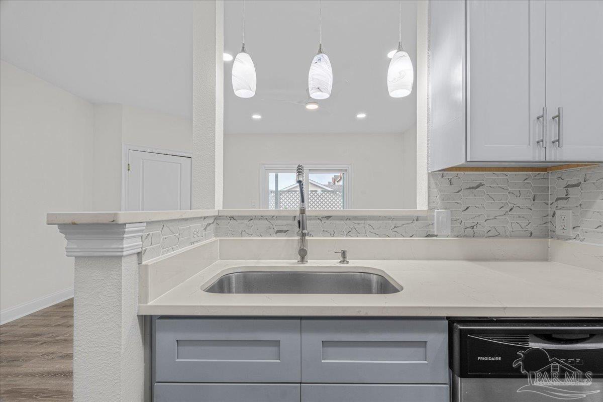 601 East Burgess Road, Unit C3 Pensacola, FL 32504 - Photo 10 of 35 a bathroom with a sink and a mirror