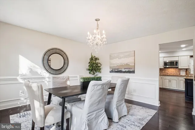 a bathroom with a shower a toilet and sink