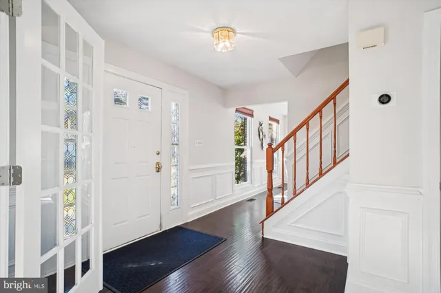 a kitchen with a table and chairs in it