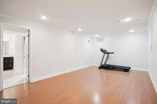 a view of a room with wooden ceiling
