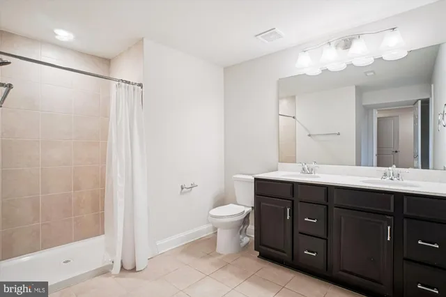 a view of a chairs and table in the balcony