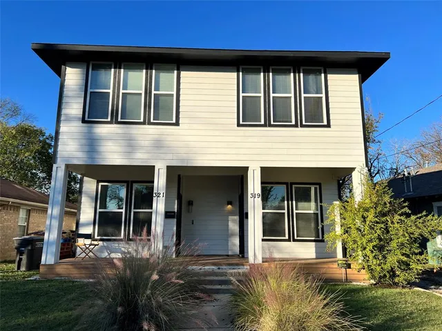 a house view with a garden space