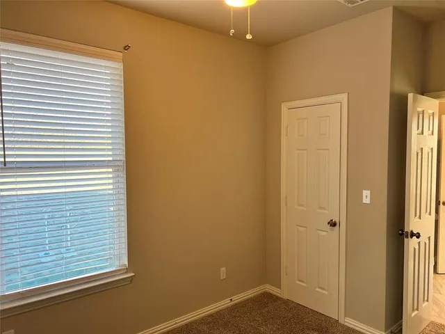 a bathroom with a sink vanity and mirror