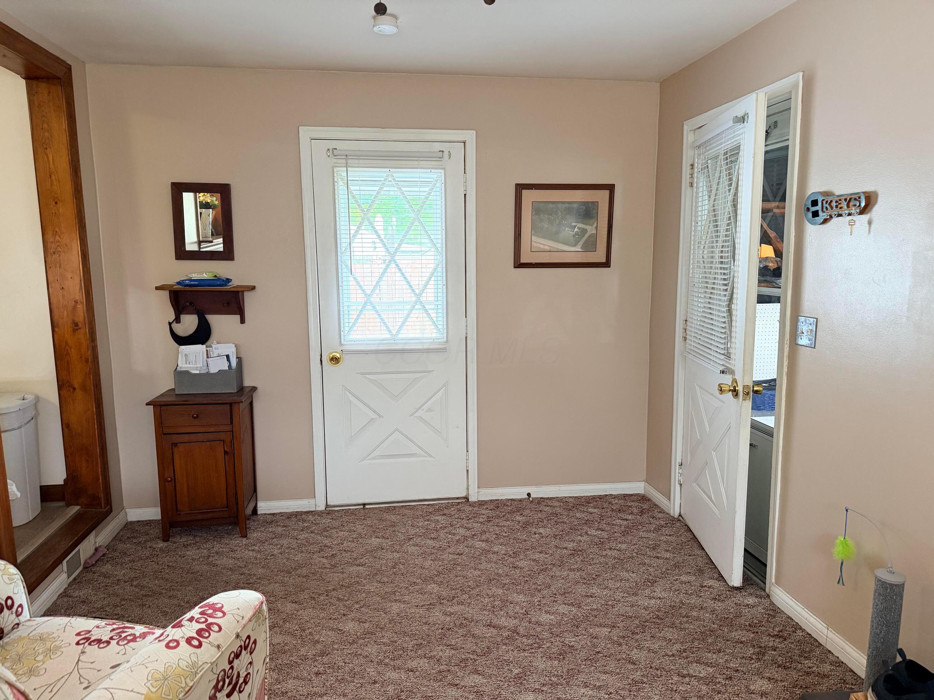 730 St Margaret Road Chillicothe, OH 45601 - Photo 16 of 31 Breezeway to garage from kitchen, with door to outside