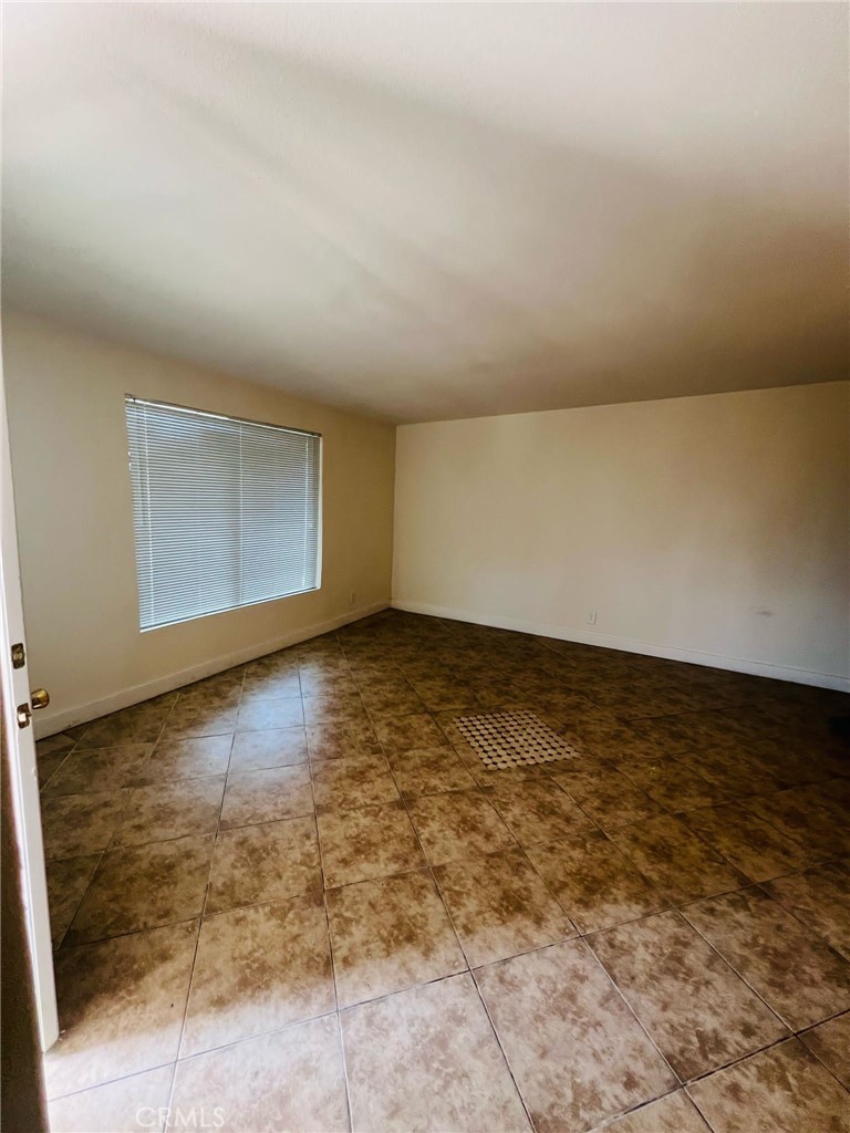 18222 9th Street Bloomington, CA 92316 - Photo 8 of 22 a view of an empty room and window