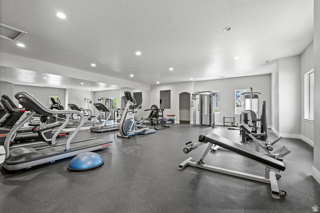 8248 South Resaca Drive, Unit J10 Sandy, UT 84070 - Photo 28 of 40 Dedicated fitness space featuring rubberized flooring