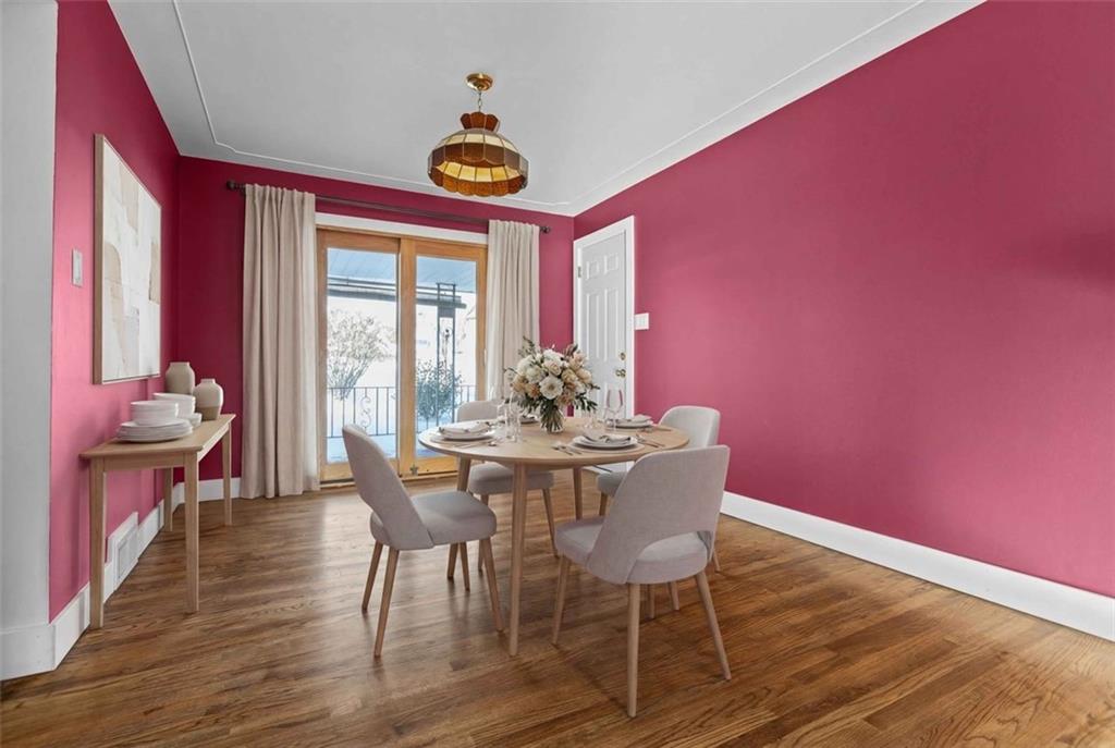 628 Marple Avenue Canonsburg, PA 15317 - Photo 8 of 18 a view of a dining room with furniture a chandelier and wooden floor
