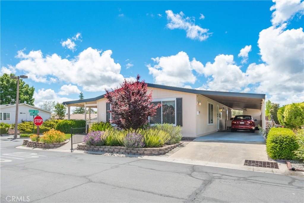 342 Bobwhite Drive Paso Robles, CA 93446 - Photo 2 of 35 a front view of a house with a yard and a garage
