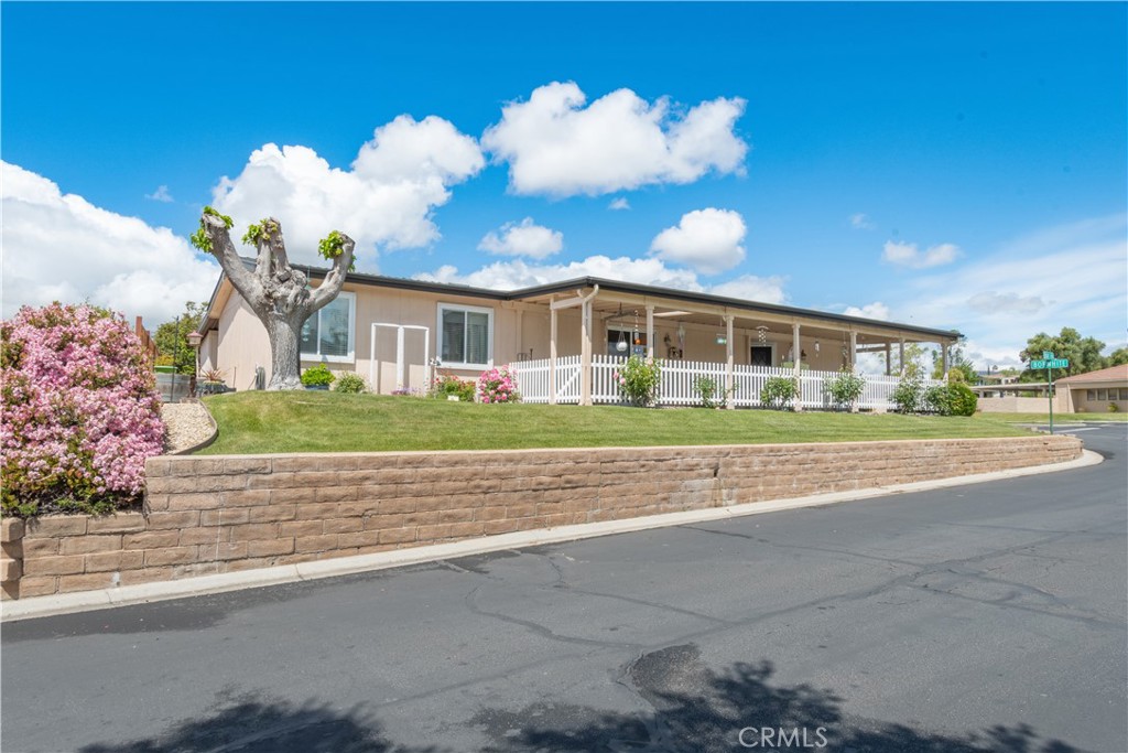 342 Bobwhite Drive Paso Robles, CA 93446 - Photo 22 of 35 a front view of a house with a yard and potted plants