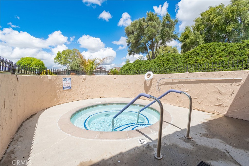 342 Bobwhite Drive Paso Robles, CA 93446 - Photo 26 of 35 a view of a swimming pool with a yard and seating space