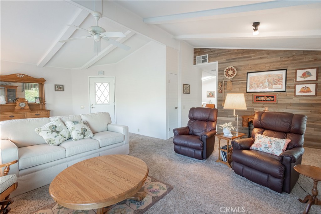 342 Bobwhite Drive Paso Robles, CA 93446 - Photo 4 of 35 a living room with furniture and a fireplace