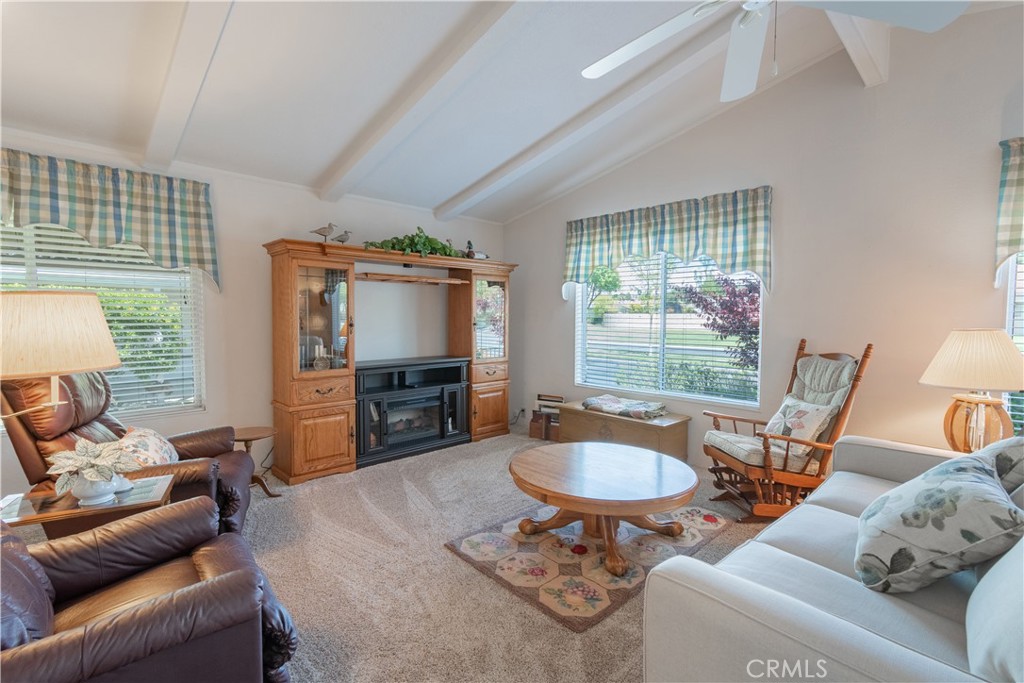 342 Bobwhite Drive Paso Robles, CA 93446 - Photo 5 of 35 a living room with furniture and a flat screen tv