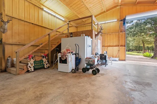 a view of a bike storage and utility room