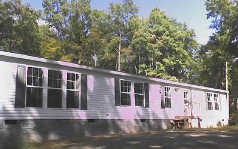 18 Wehutty Road Murphy, NC 28906 - Photo 1 of 1 a front view of a house with yard and tree s