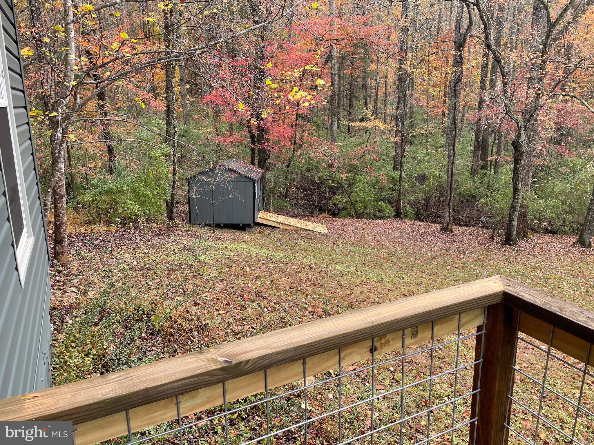 240 Whorton Hollow Road Castleton, VA 22716 - Photo 33 of 37 Juliette balcony looking towards the shed