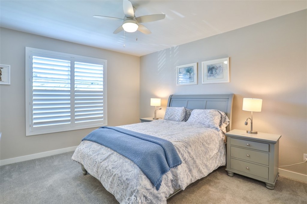 3318 Doheny Way Dana Point, CA 92629 - Photo 17 of 55 a bedroom with a bed and a window