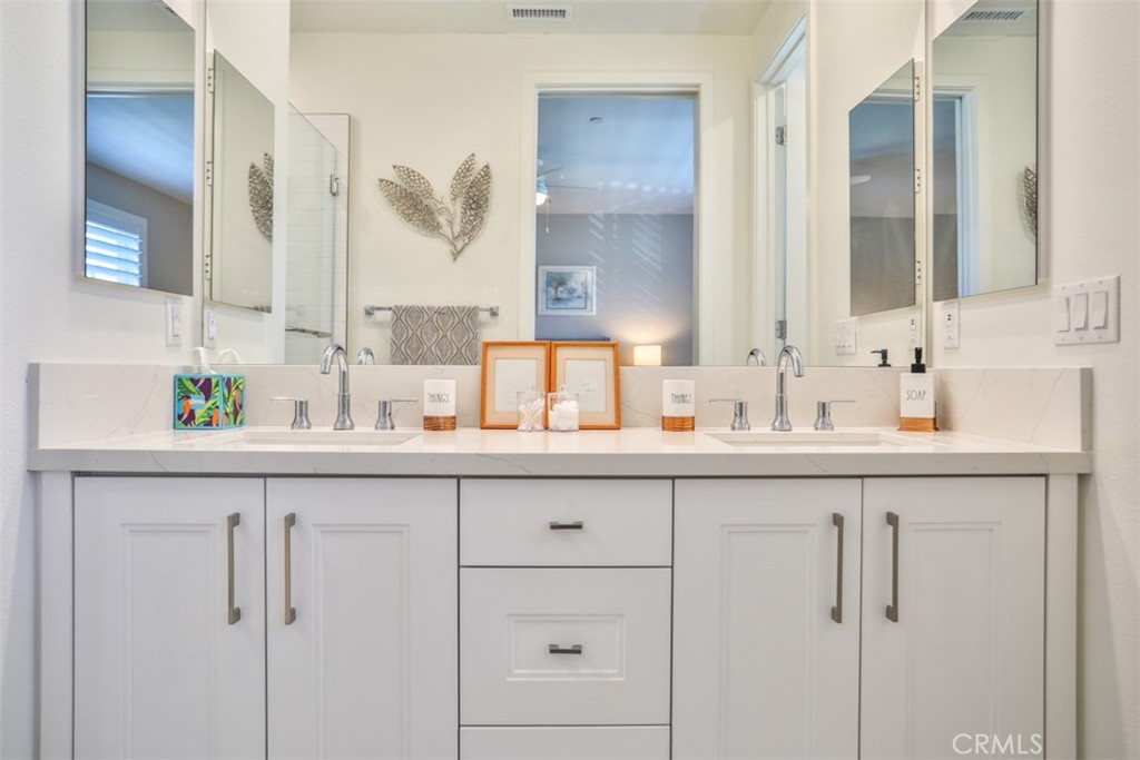 3318 Doheny Way Dana Point, CA 92629 - Photo 48 of 55 a bathroom with cabinets and sink