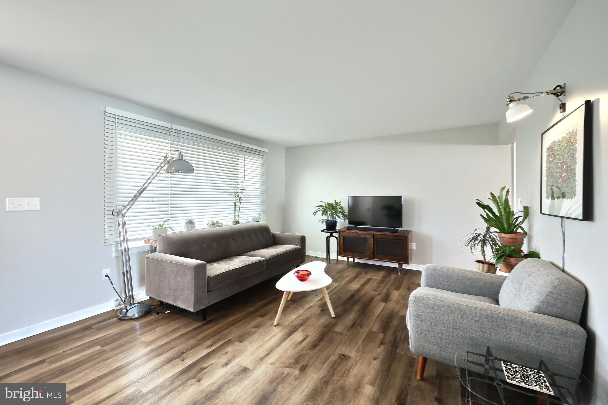 55 Cardinal Drive Hanover, PA 17331 - Photo 18 of 53 a living room with furniture and a flat screen tv