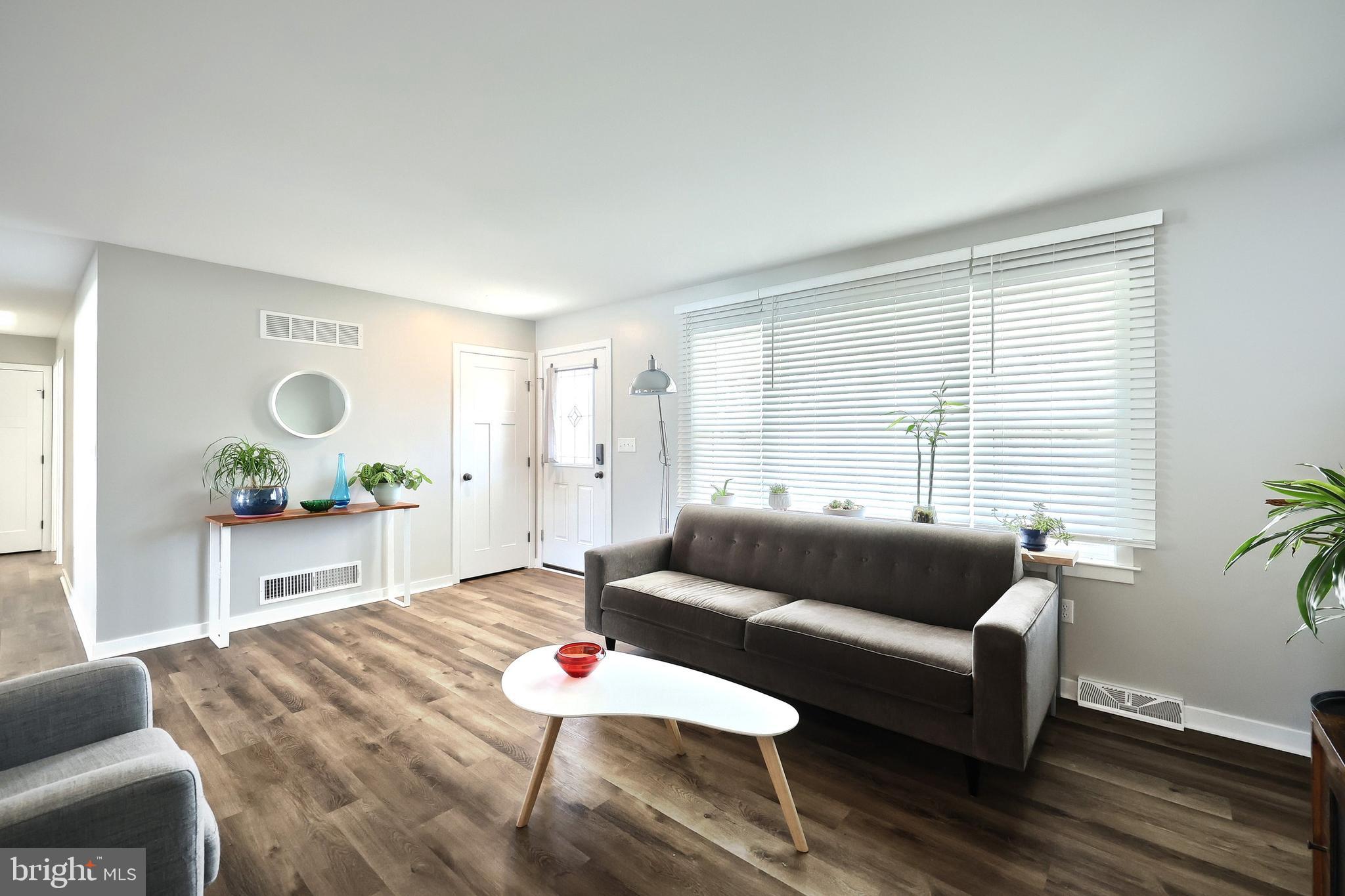 55 Cardinal Drive Hanover, PA 17331 - Photo 19 of 53 a living room with furniture and wooden floor