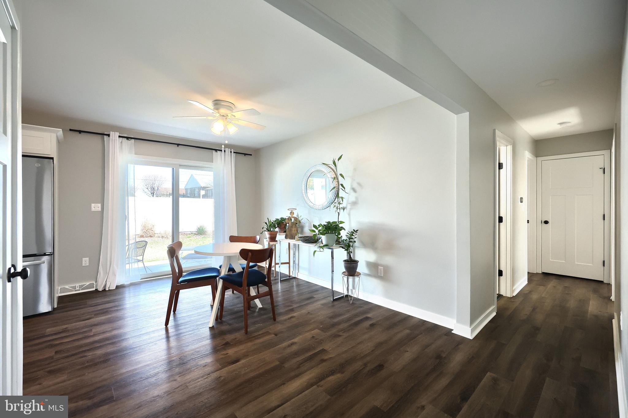 55 Cardinal Drive Hanover, PA 17331 - Photo 21 of 53 a view of a dining room with furniture and wooden floor