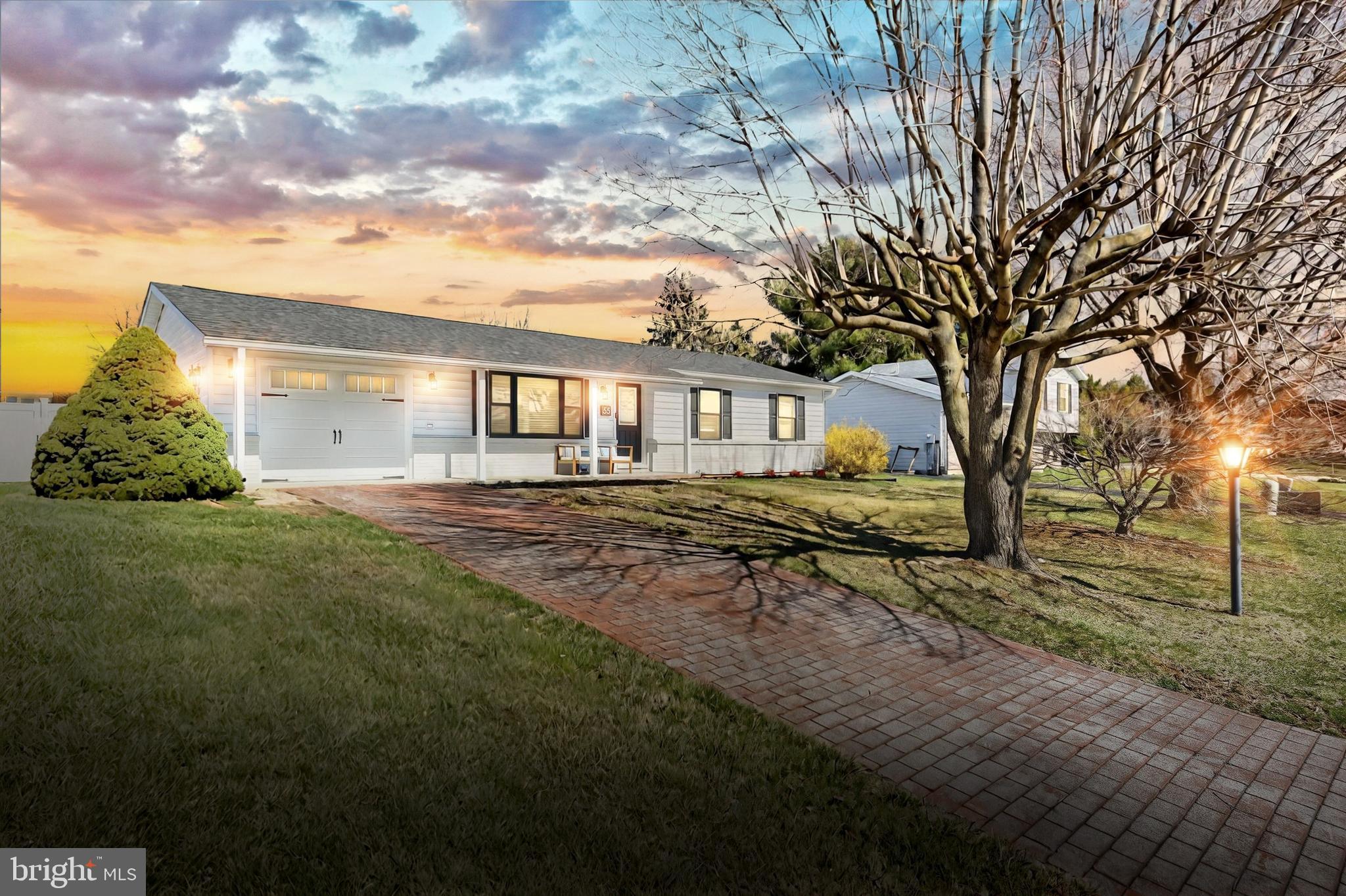 55 Cardinal Drive Hanover, PA 17331 - Photo 3 of 53 a backyard of a house with table and chairs