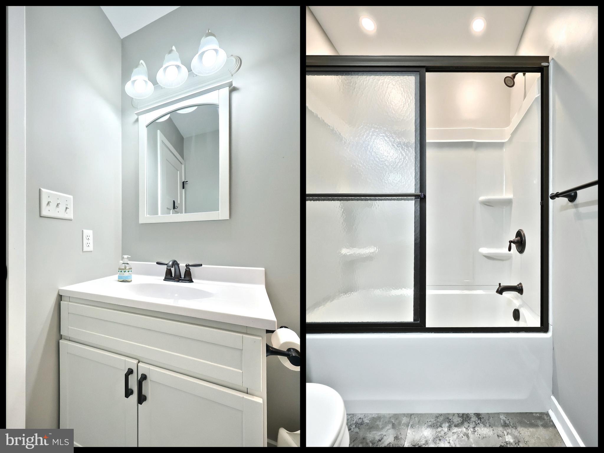 55 Cardinal Drive Hanover, PA 17331 - Photo 31 of 53 a bathroom with a sink mirror and vanity