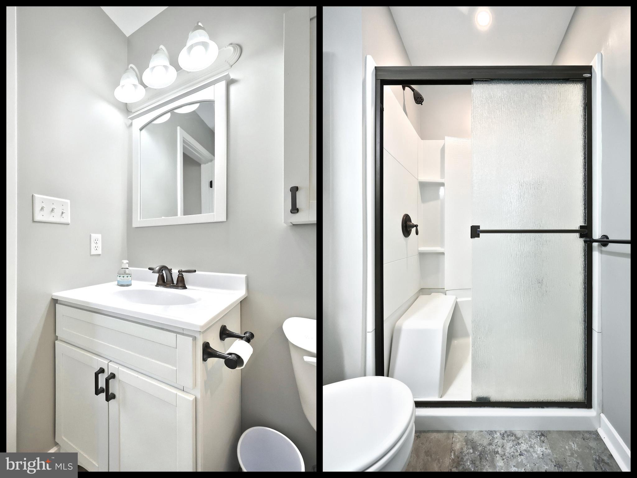 55 Cardinal Drive Hanover, PA 17331 - Photo 36 of 53 a bathroom with a sink a mirror a toilet and shower