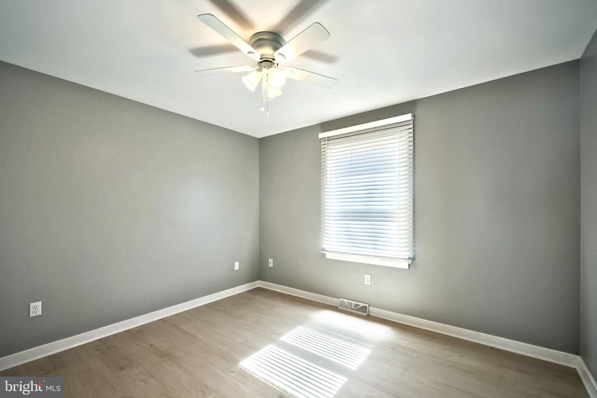 55 Cardinal Drive Hanover, PA 17331 - Photo 37 of 53 an empty room with windows and fan