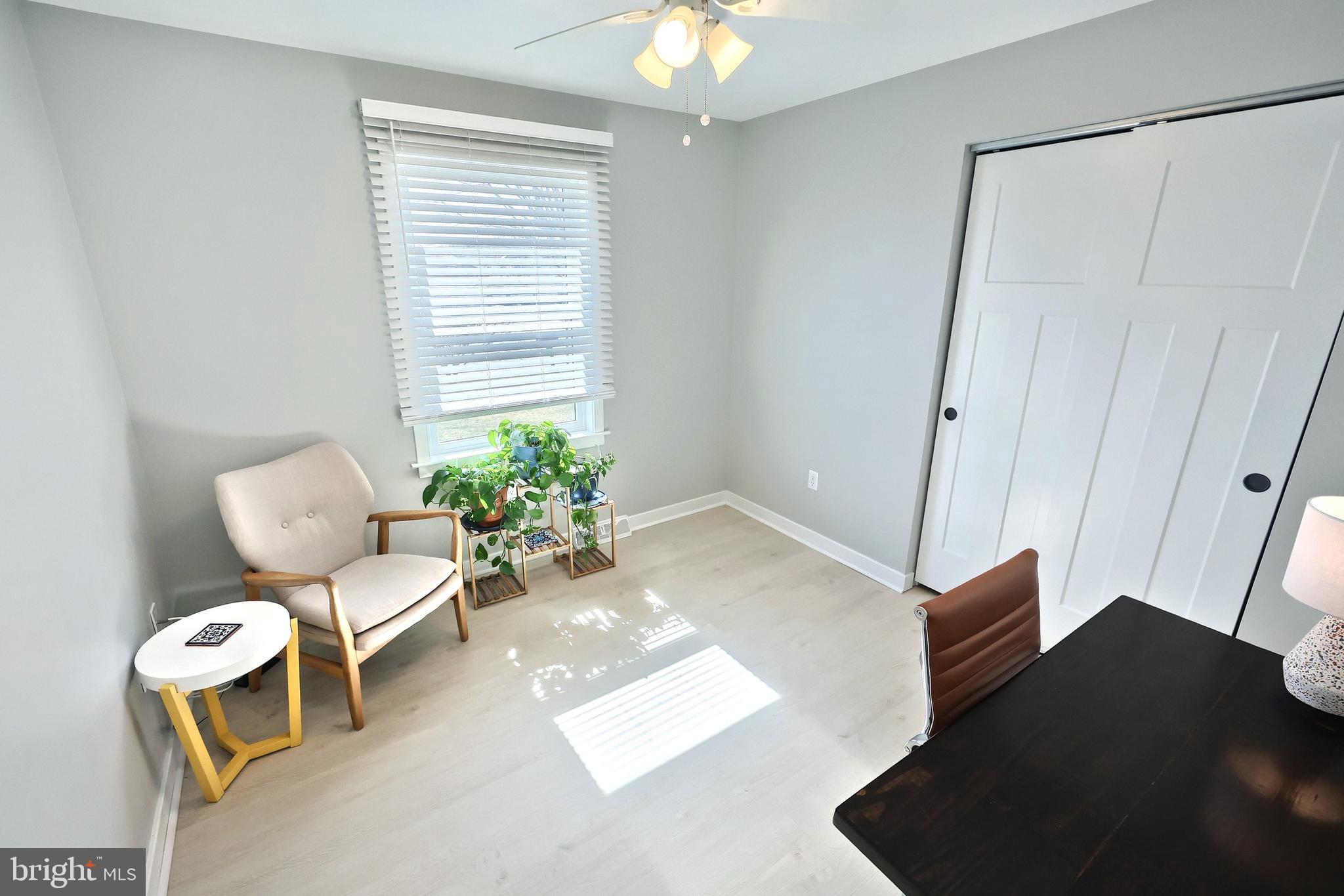 55 Cardinal Drive Hanover, PA 17331 - Photo 39 of 53 a living room with furniture and a potted plant