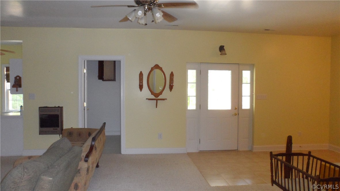 393 New Beginnings Road Shacklefords, VA 23156 - Photo 25 of 36 Walk Out Basement Door Opens to Covered Patio and