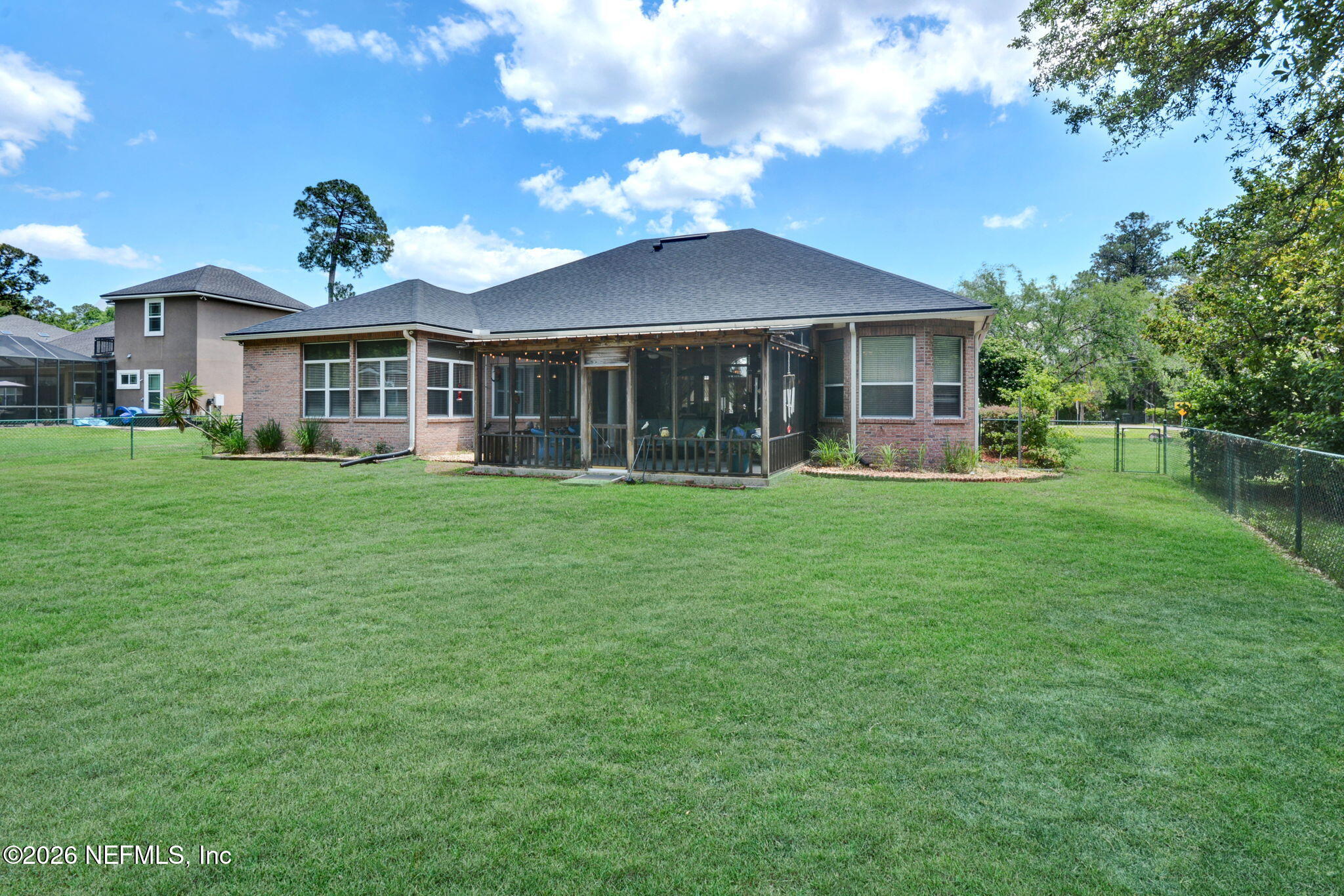 5950 West Shores Road Orange Park, FL 32003 - Photo 39 of 42 a front view of a house with a yard