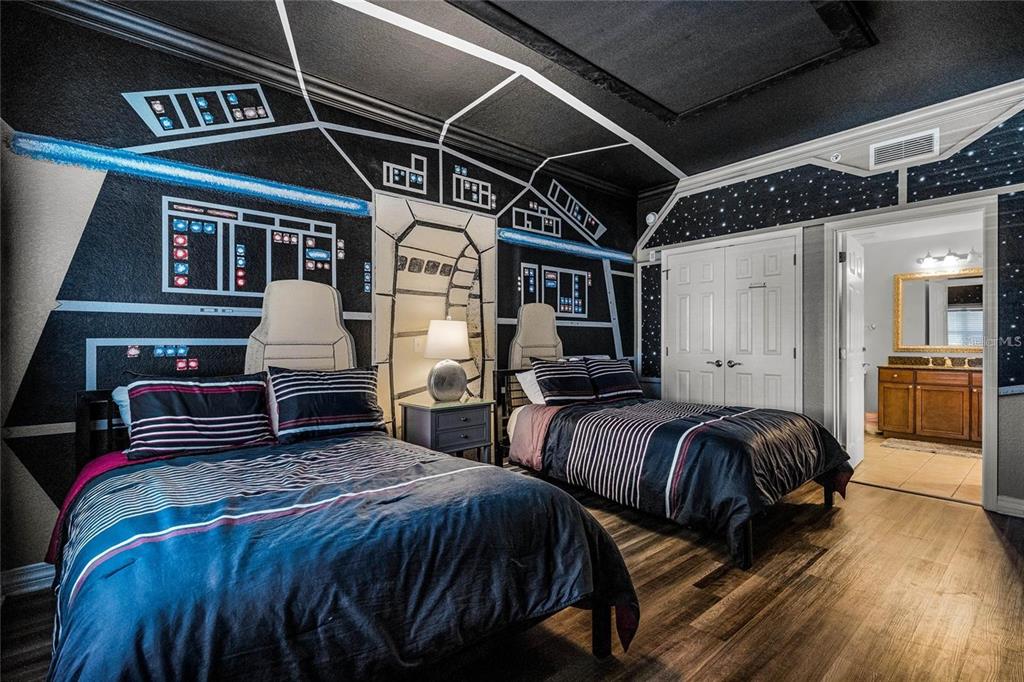 1102 Sunset View Circle, Unit 204 Reunion, FL 34747 - Photo 8 of 26 a spacious bedroom with two beds and a walk in closet