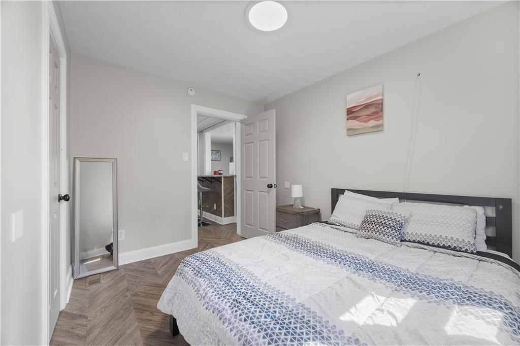 144 Bigham Street Pittsburgh, PA 15211 - Photo 23 of 45 a bedroom with a bed and a closet