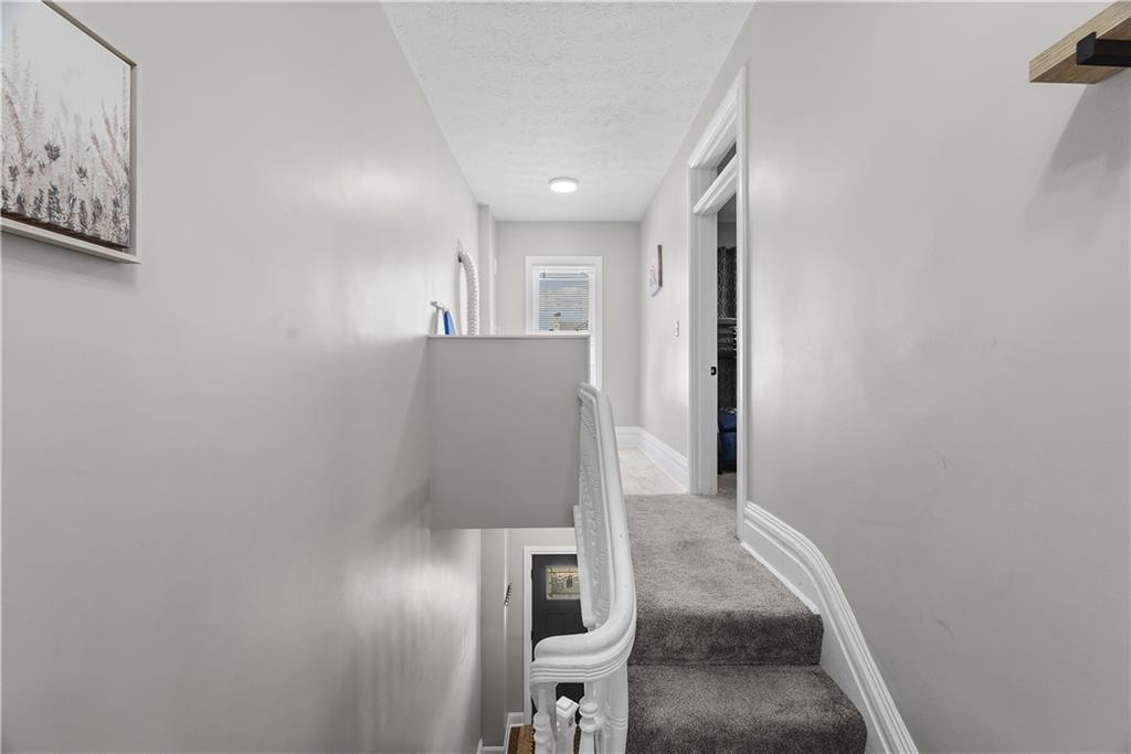 144 Bigham Street Pittsburgh, PA 15211 - Photo 25 of 45 a view of a hallway with entryway