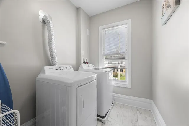 a bed room with a bed and a window