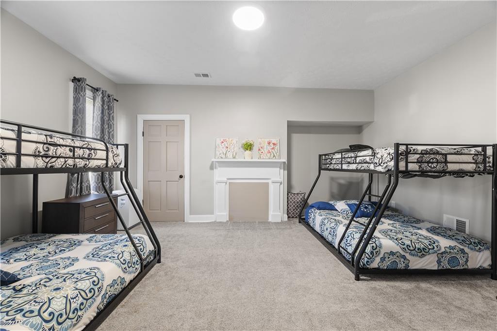 144 Bigham Street Pittsburgh, PA 15211 - Photo 32 of 45 a bedroom with bed and a window