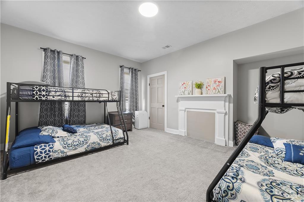 144 Bigham Street Pittsburgh, PA 15211 - Photo 33 of 45 a bedroom with a bed and a window