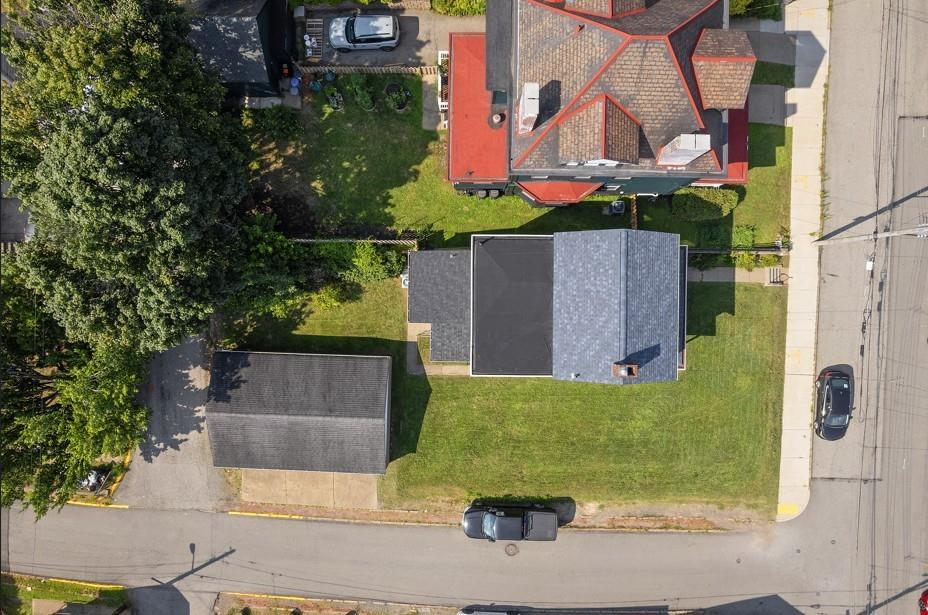 144 Bigham Street Pittsburgh, PA 15211 - Photo 39 of 45 an aerial view of a house with a yard